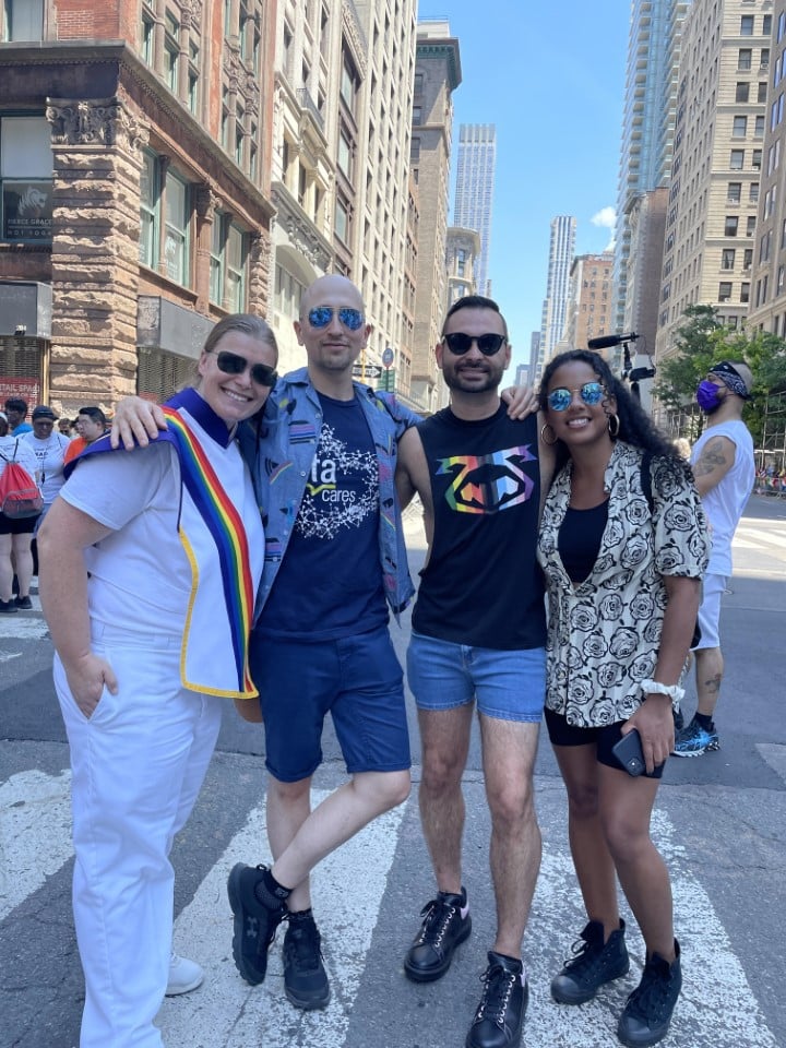 Zeta team members posing at Pride