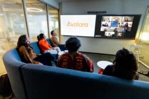 A group of Avalara employees meet for a conference call.