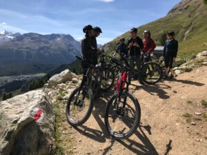 Isovalent team bicycling on mountain